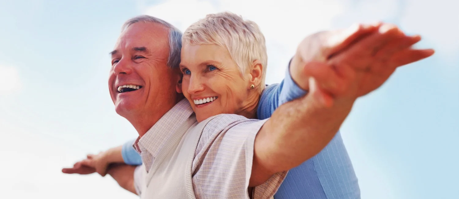 Cropped_Happy_Senior_Couple_Stretching_63618851.jpg