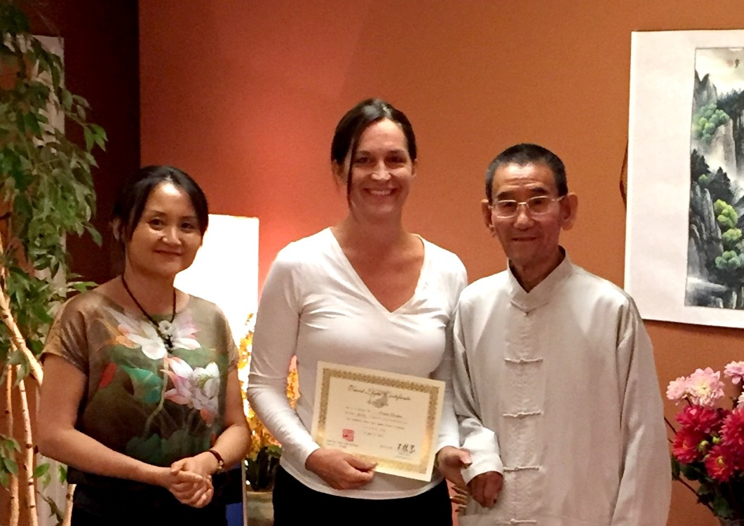 Kristen Hawkes (middle) with Master Weiye Wang (right) and Chiyan on June 27, 2015