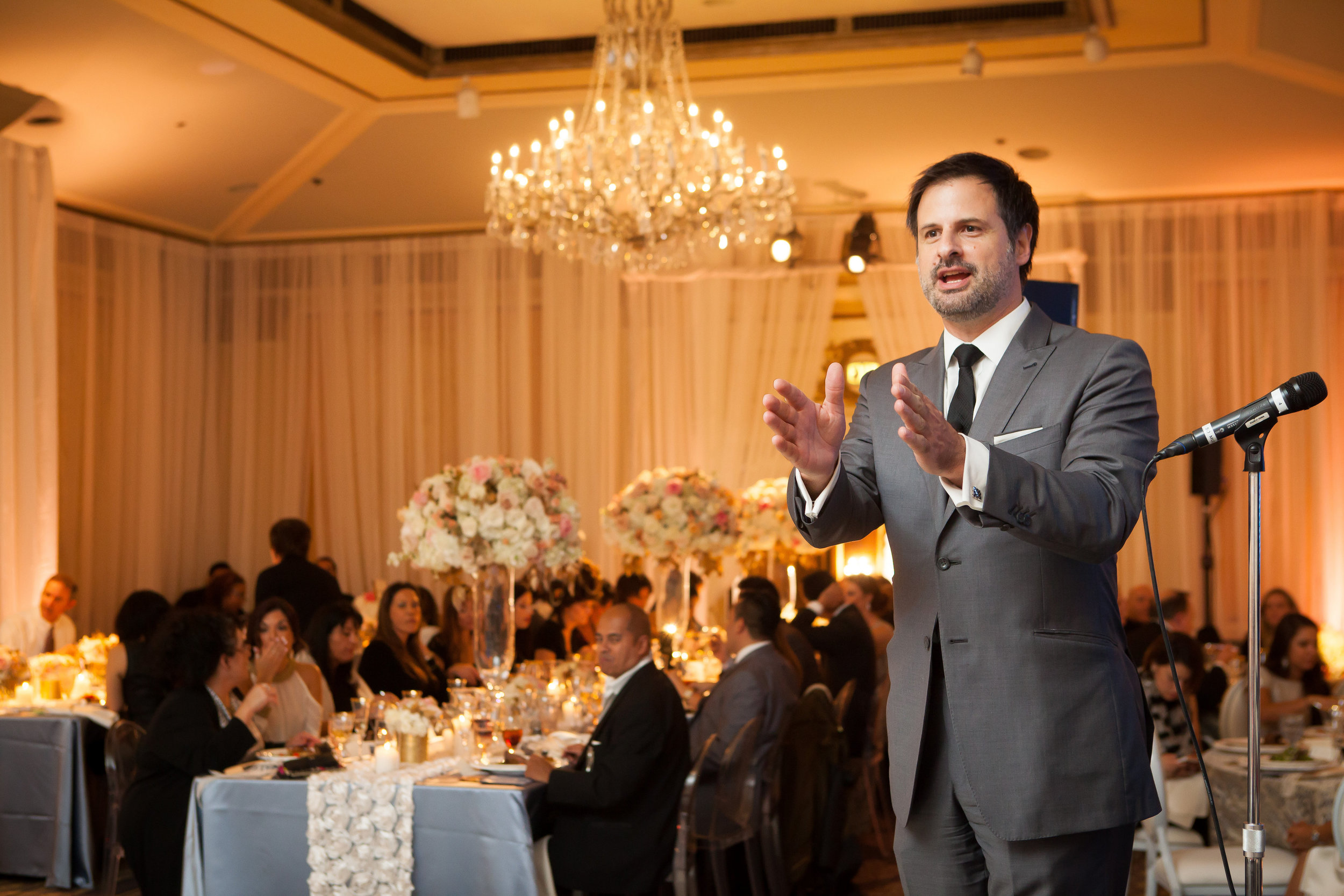 Serving as emcee and entertainment at a Gala Event at the Sir Francis Drake Hotel, in San Francisco
