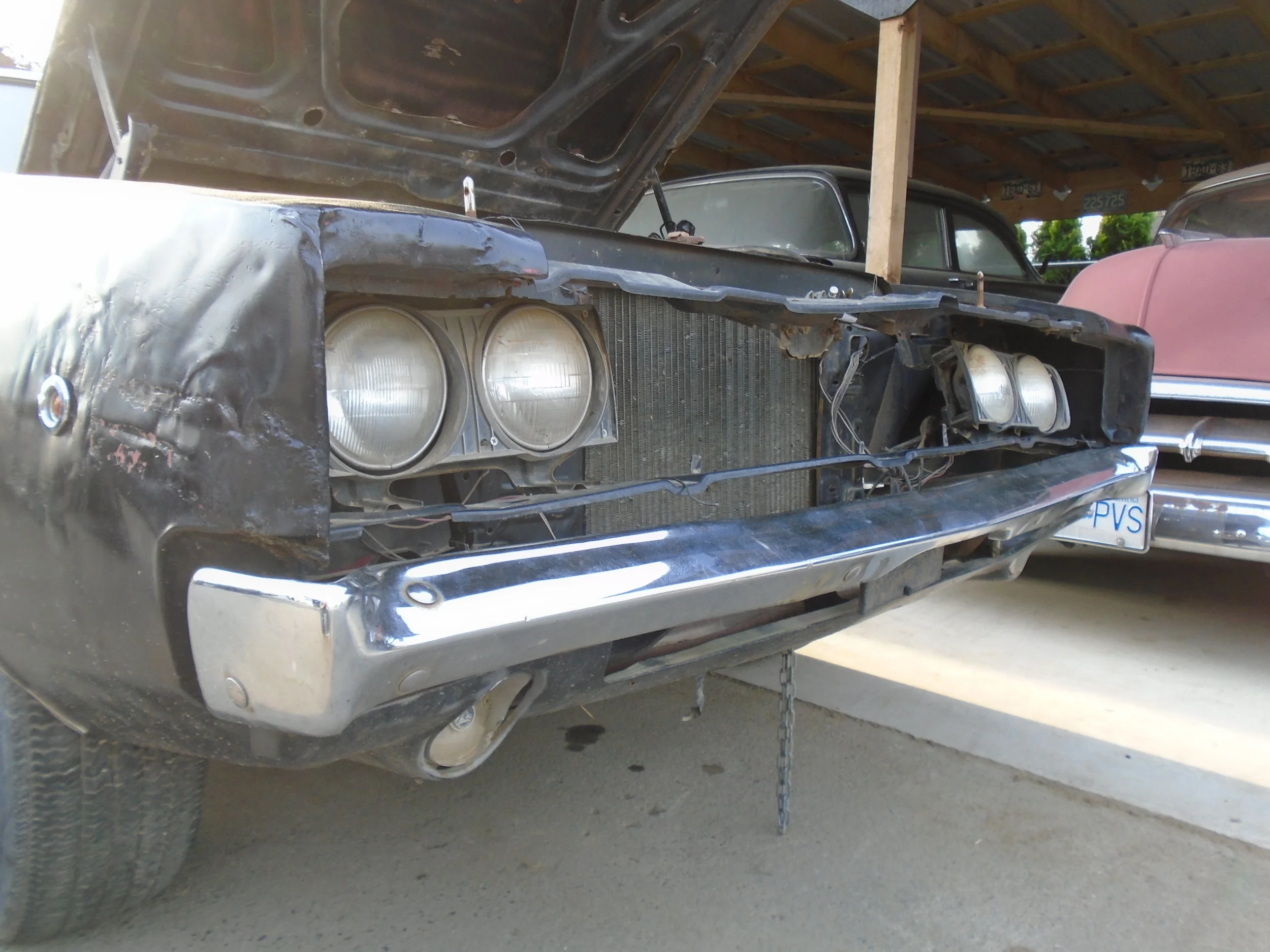  The grille was missing and the whole front end was beat pretty bad.&nbsp; 