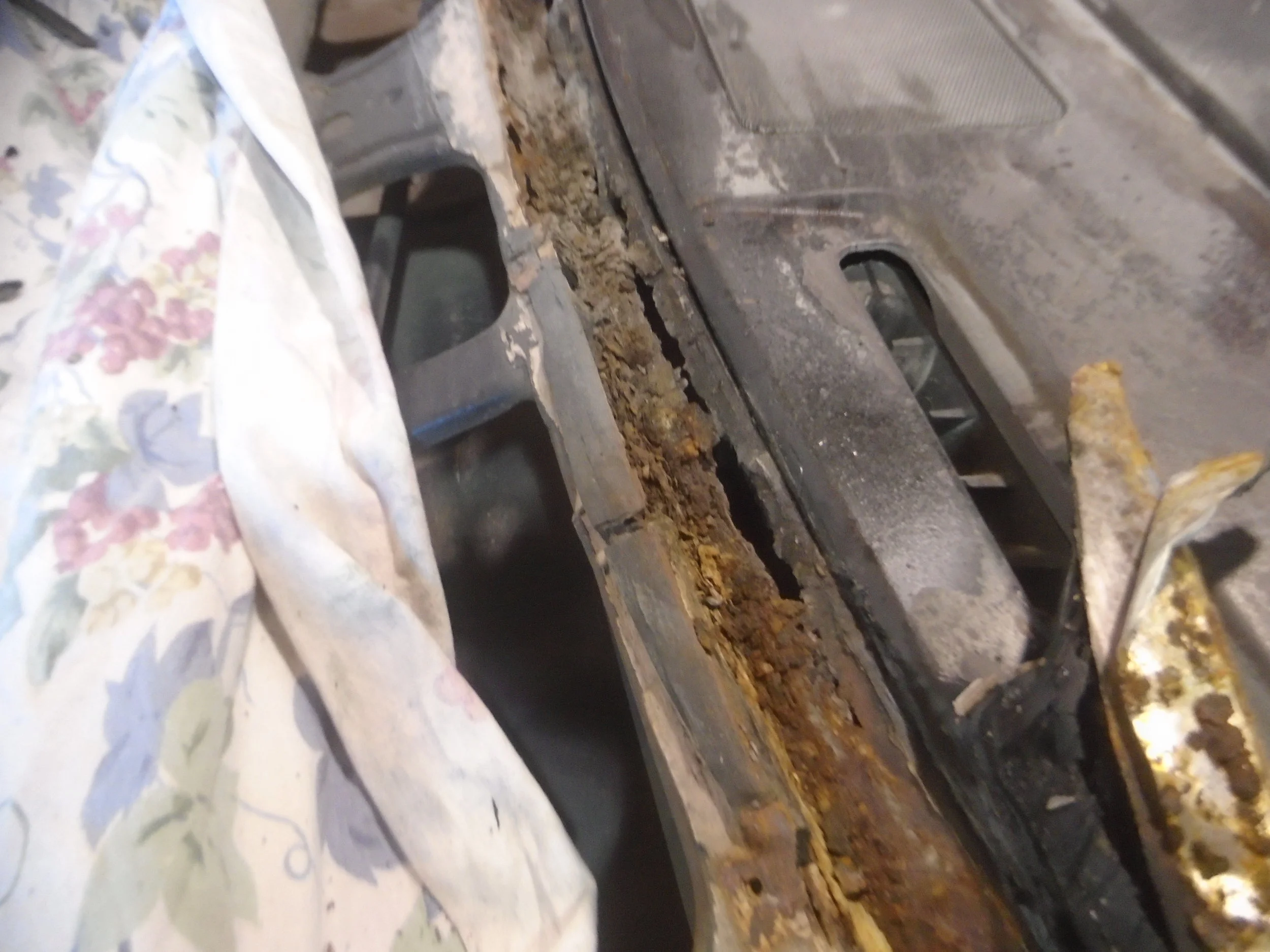  We had to remove the windshield in order to install the new vinyl top and this is what we found 