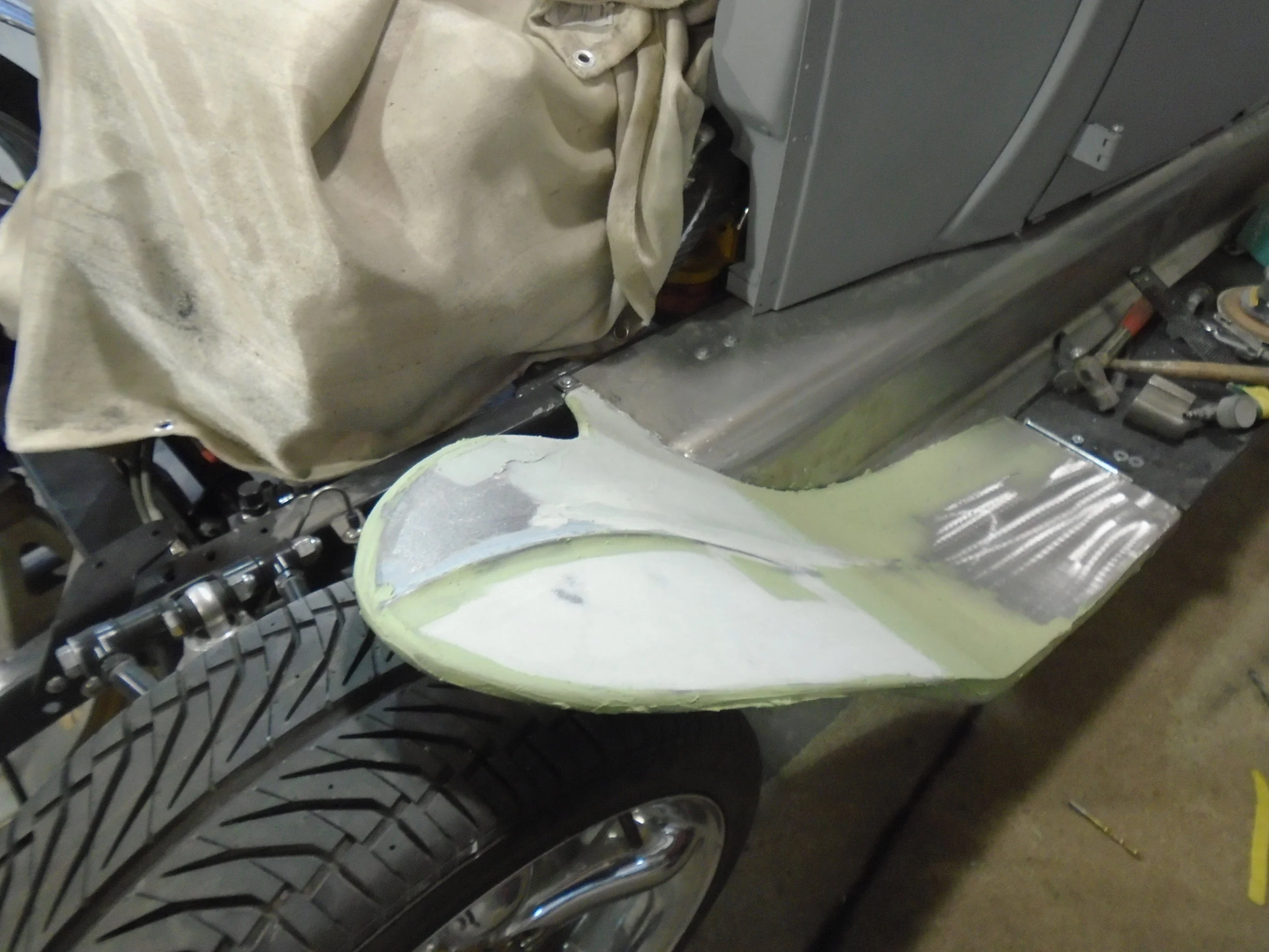  Here is the beginning of the bodywork on the custom fenders 