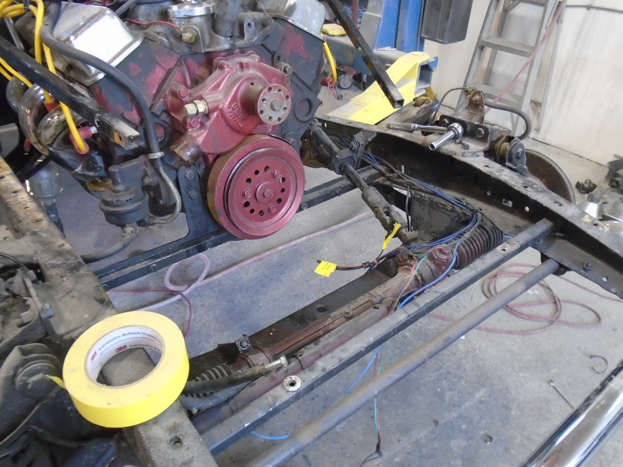  The engine was hard mounted to the frame with a homemade bracket that someone had to cut to clear the steering column knuckles so we are removing that and fabricating engine mounts that will allow for some movement when the engine torques. 