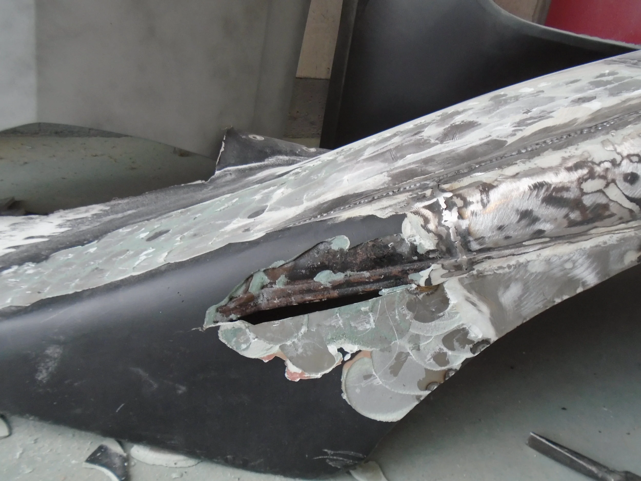  We found gaping holes filled with bondo and newspaper 