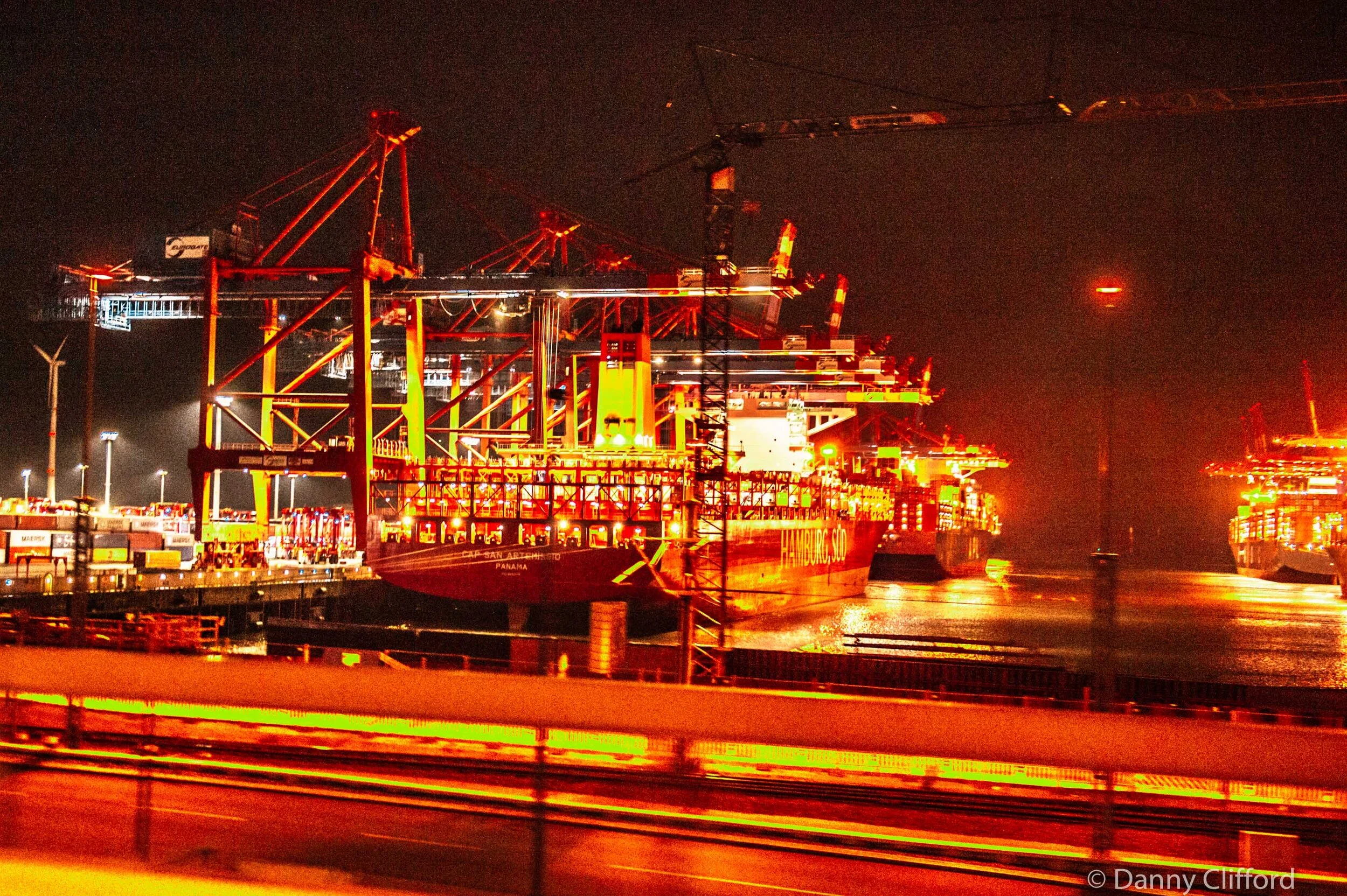Passing ships in the night. This was us racing past some big old ships in Hamburg as we passed through Germany towards Holland..