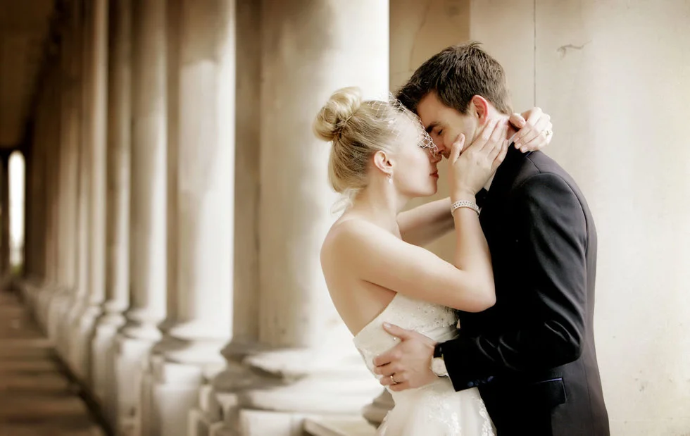 london wedding photographer pillars bride and groom