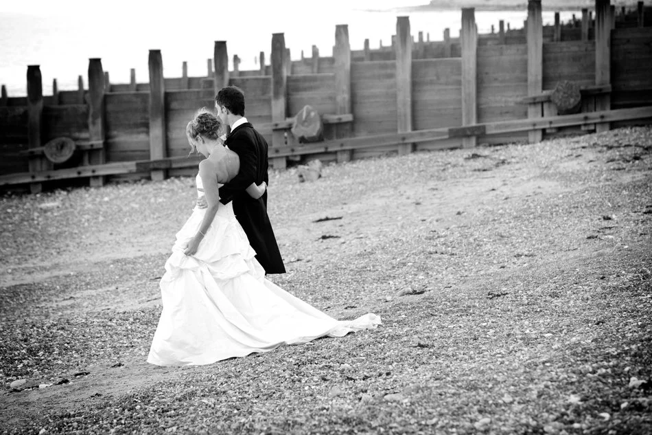 eastbourne wedding photographer beach bride and groom black and white