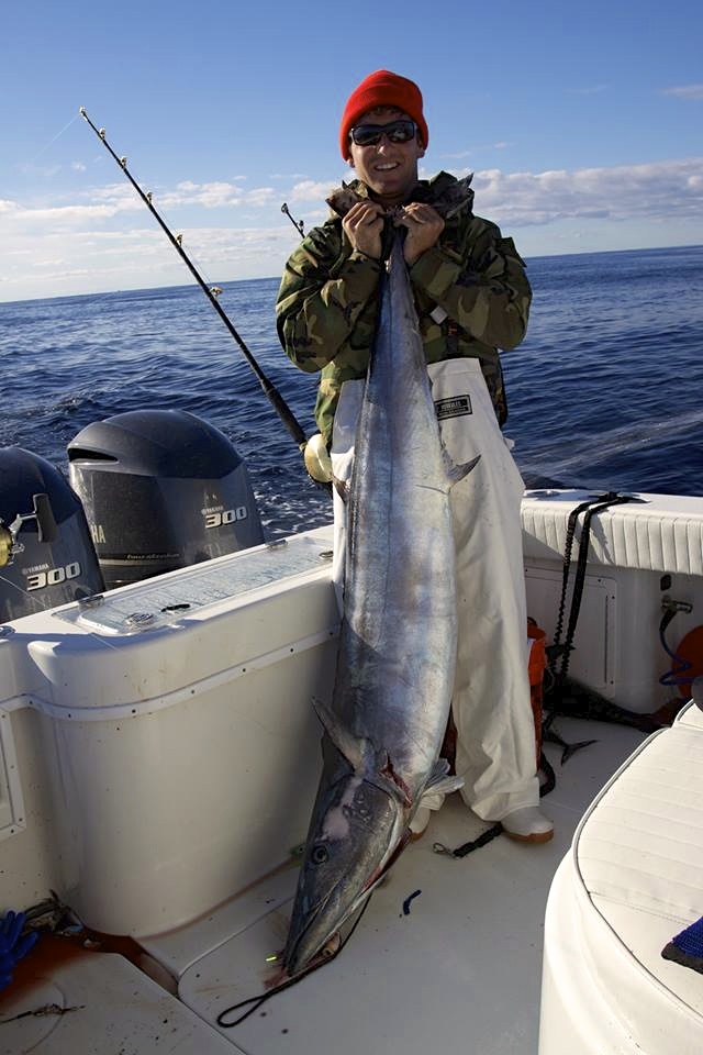 Tim Cohan with a monster Wahoo caught on one of our stand up rods in the North East canyons