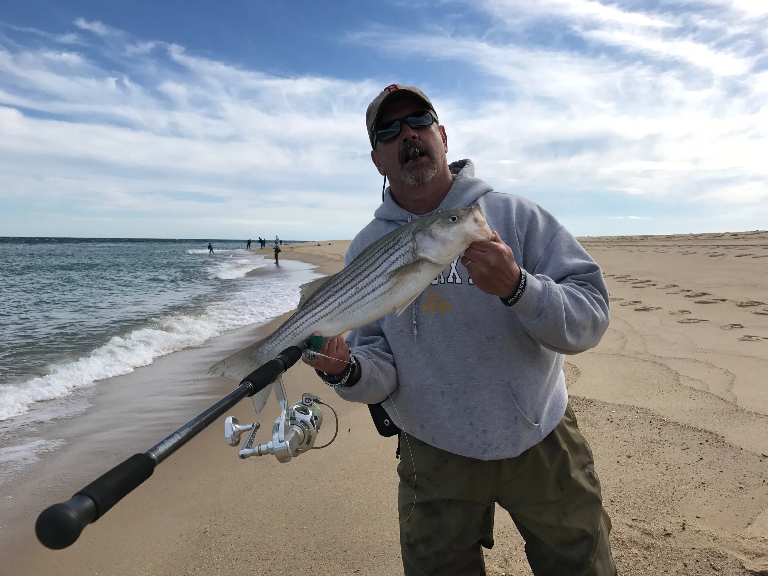 Hi Chris, Hope all is well. Thought you might want to see the first fish I caught with my (your) new rod. Not huge but what a great way to break-in the rod. Also caught four nice blues which is normally not remarkable but I was able to reach them and hook up where others couldn't reach. What a great rod!!!! Thanks so much, Brad 