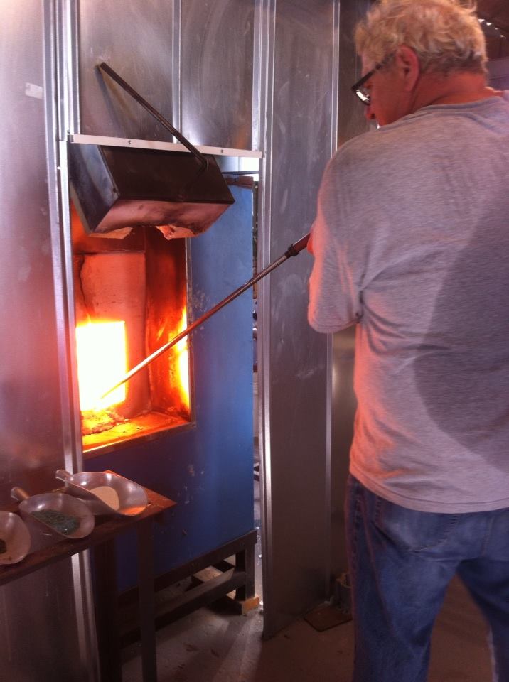 Ed gathers the 2150 degree molten glass.