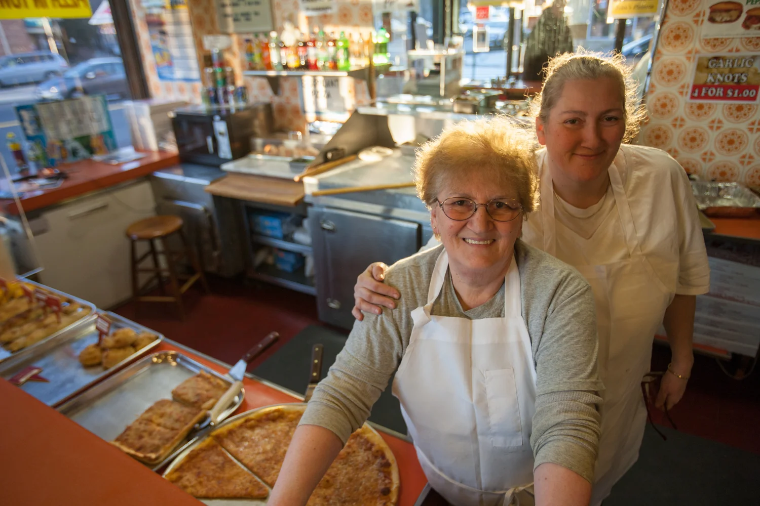 This mother and daughter team, who together run the show at John's Pizza in Elmhurst, are a rare example of female pizza makers in NYC.