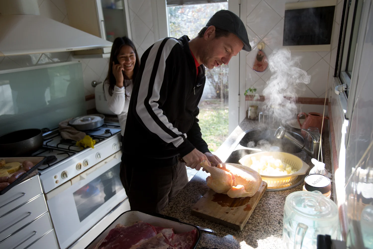 Man Prepares Chicken, Argentina