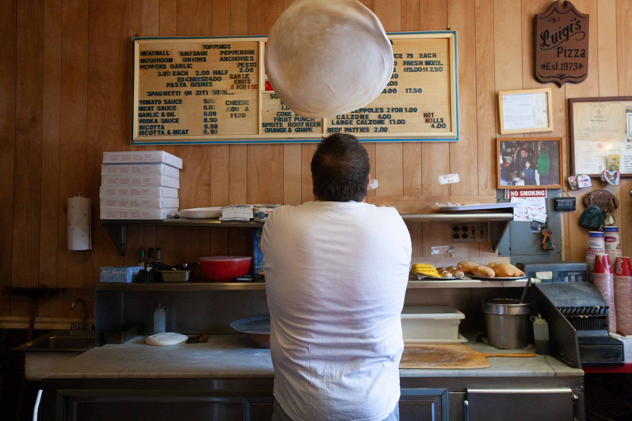 Giovanni Lanzo, co-owner of Luigi's Pizza on 5th Avenue in Sunset Park.