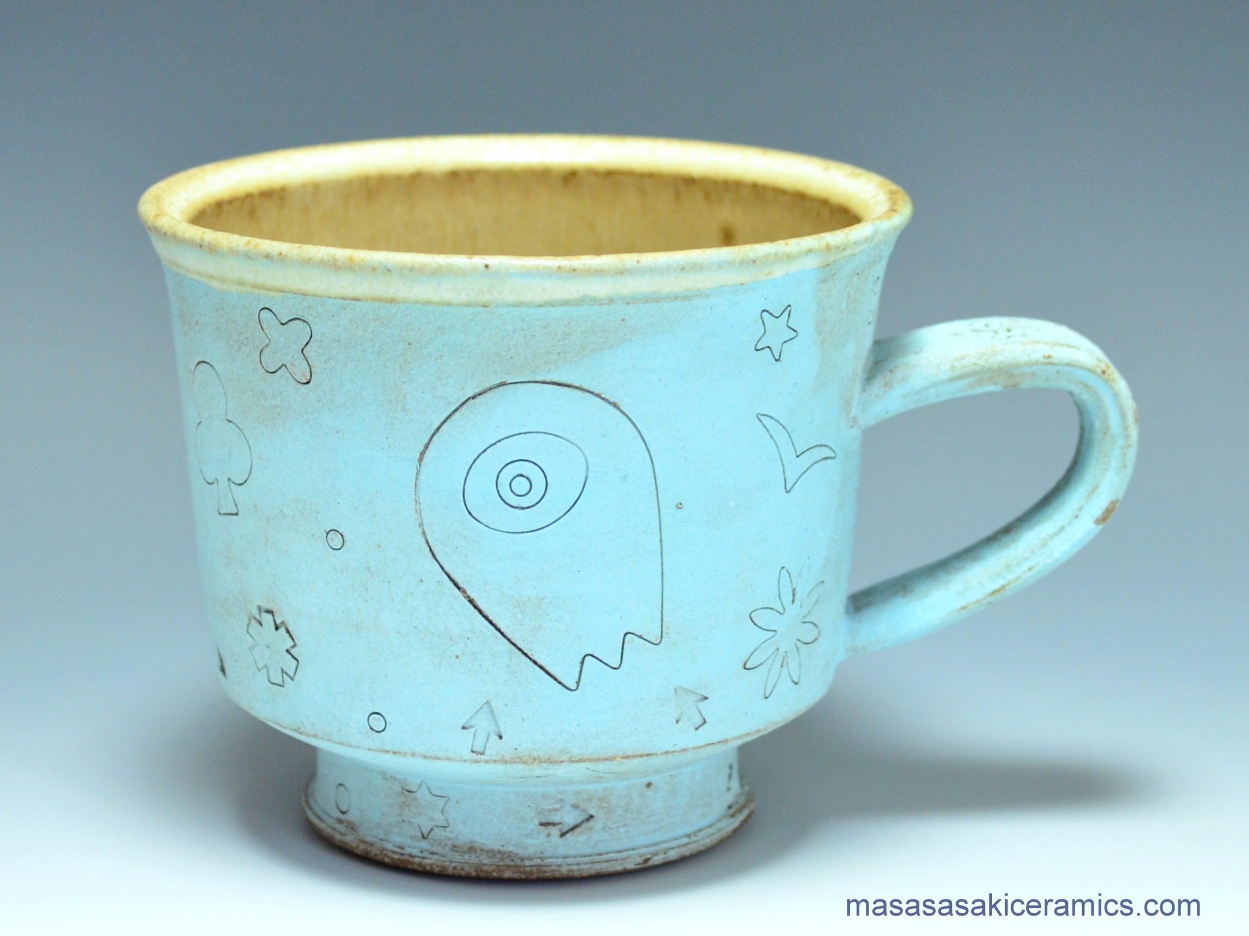 black mountain mug with one eyed alien