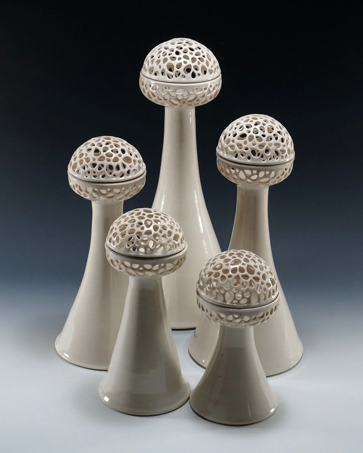 Porcelain Tea Candle Tower Set
My modern take on the traditional candelabra &mdash; this handmade set features five porcelain towers of varying heights, designed to create a harmonious and sculptural visual flow.

When lit (swipe to see photo 2!), th