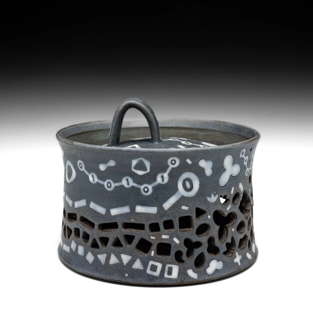 Dark Grey Garlic Keeper 🧄

One of my favorite designs. 🙌 This handmade garlic keeper holds 7&ndash;8 garlic bulbs and helps keep them fresh by allowing air to circulate through the uniquely cutout holes while the lid protects them from direct light