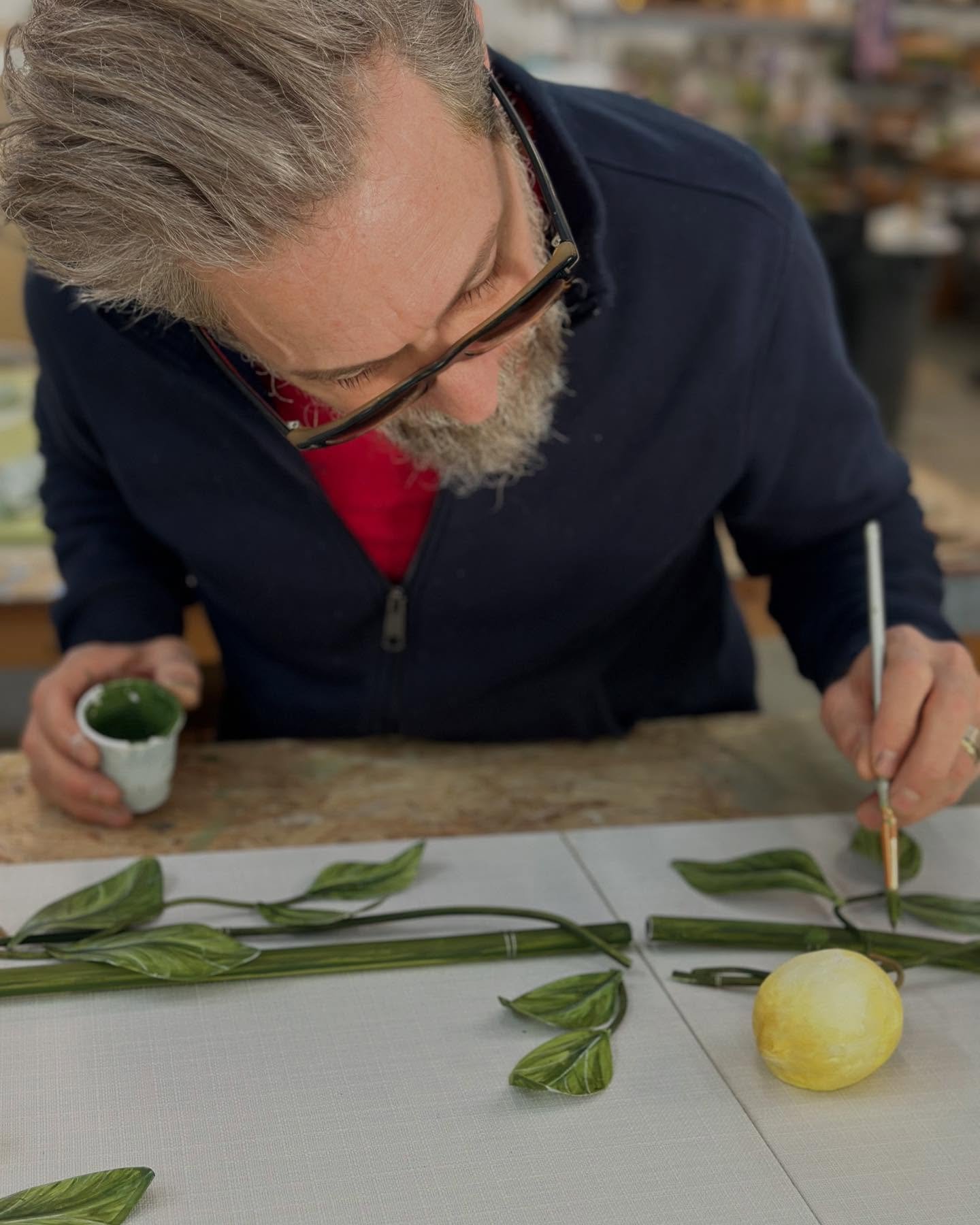 On my studio table 🌳 #highpointmarket #highpointxdesign #suitesatmarketsquare #art #ncartist #lemontrellis #italy #lemons #tole #flowers #localart #tommymitchell #tommymitchellco