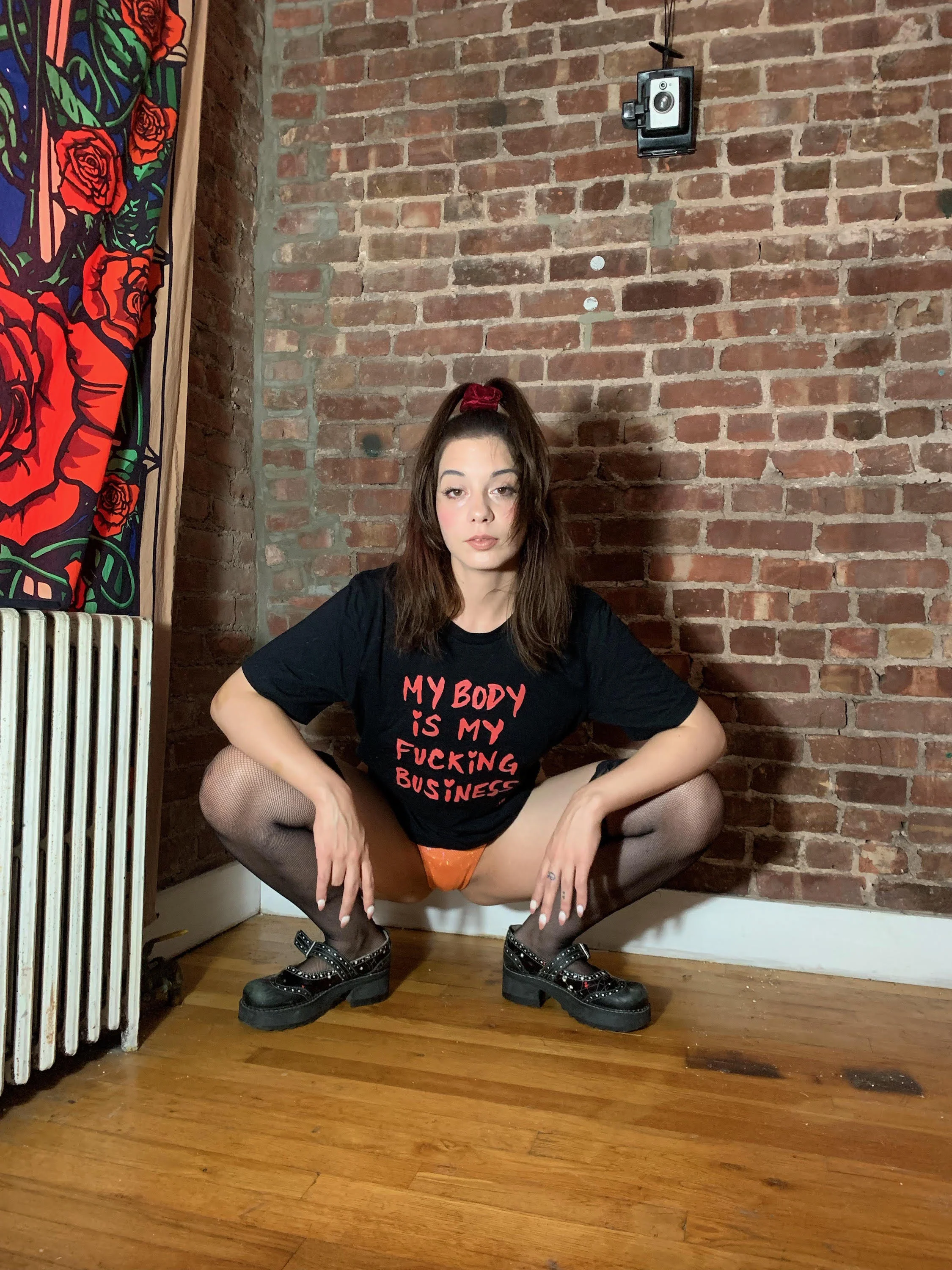 Hannah in the #TiredSlut t-shirt from Strippers Forever.