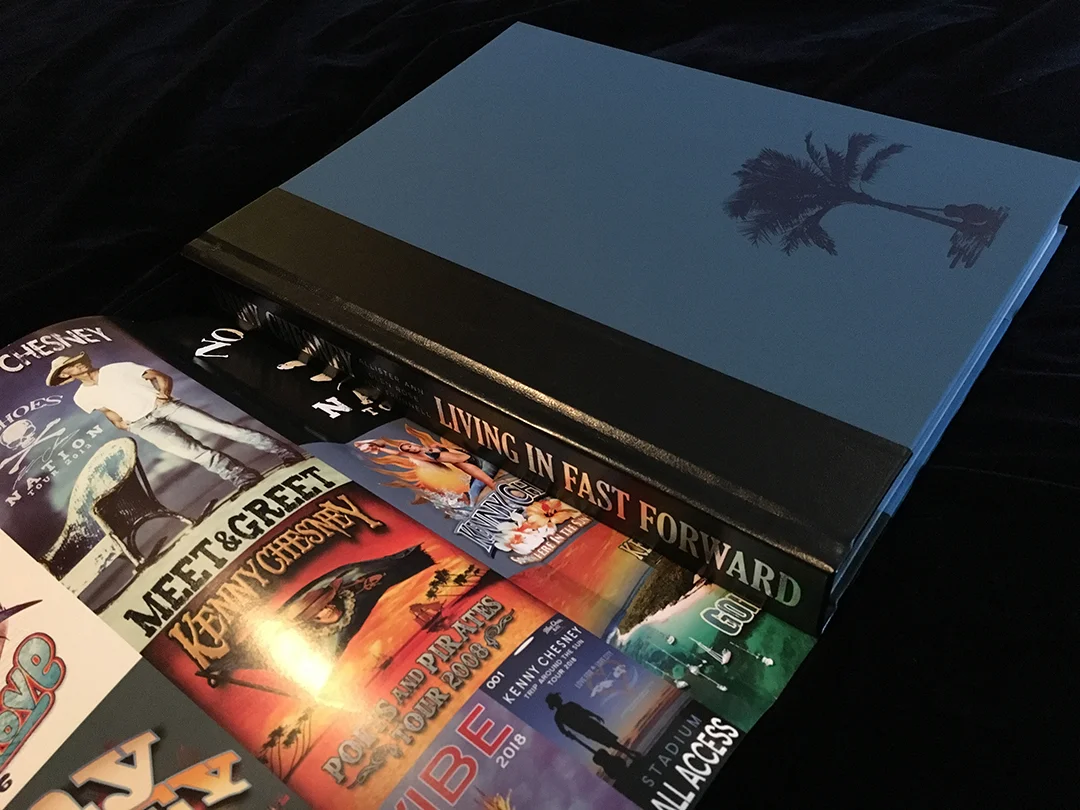 A double-sided dust jacket means I could design for an awesome, colorful “Easter Egg” of backstage passes on the inside of it. A silver foil stamp on the spine mimics the design on the dust jacket.