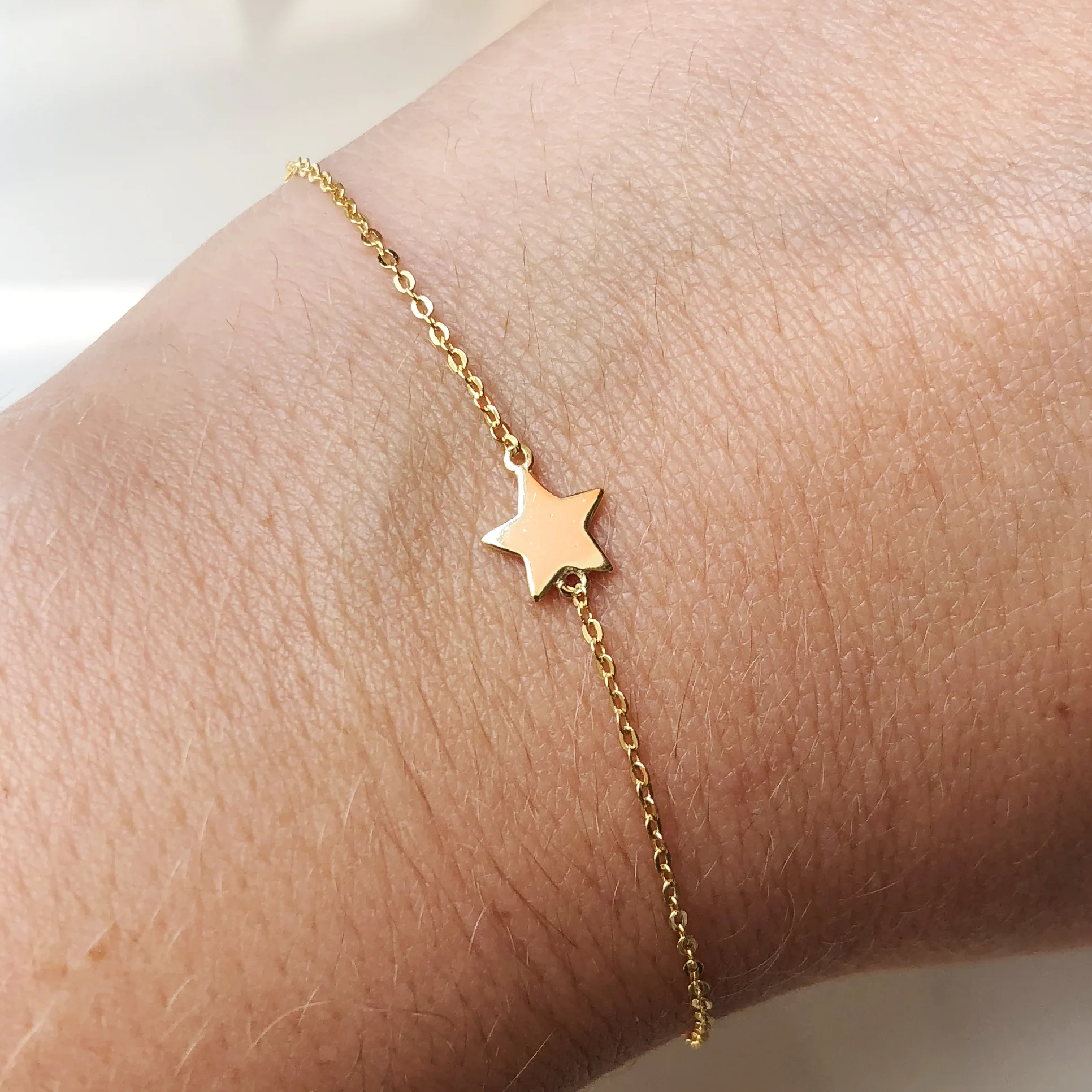 Single Star bracelet Gold.jpg