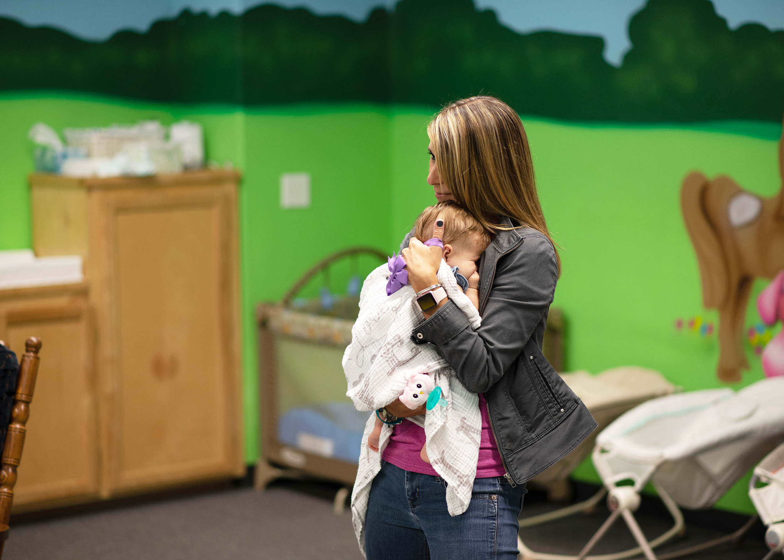 Woman Holding Baby.png