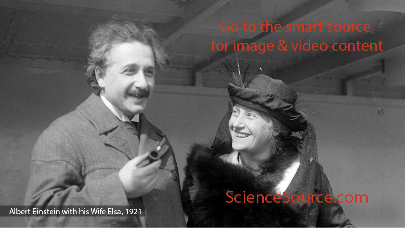 Einstein Smoking a Pipe and Wife Elsa, 1921