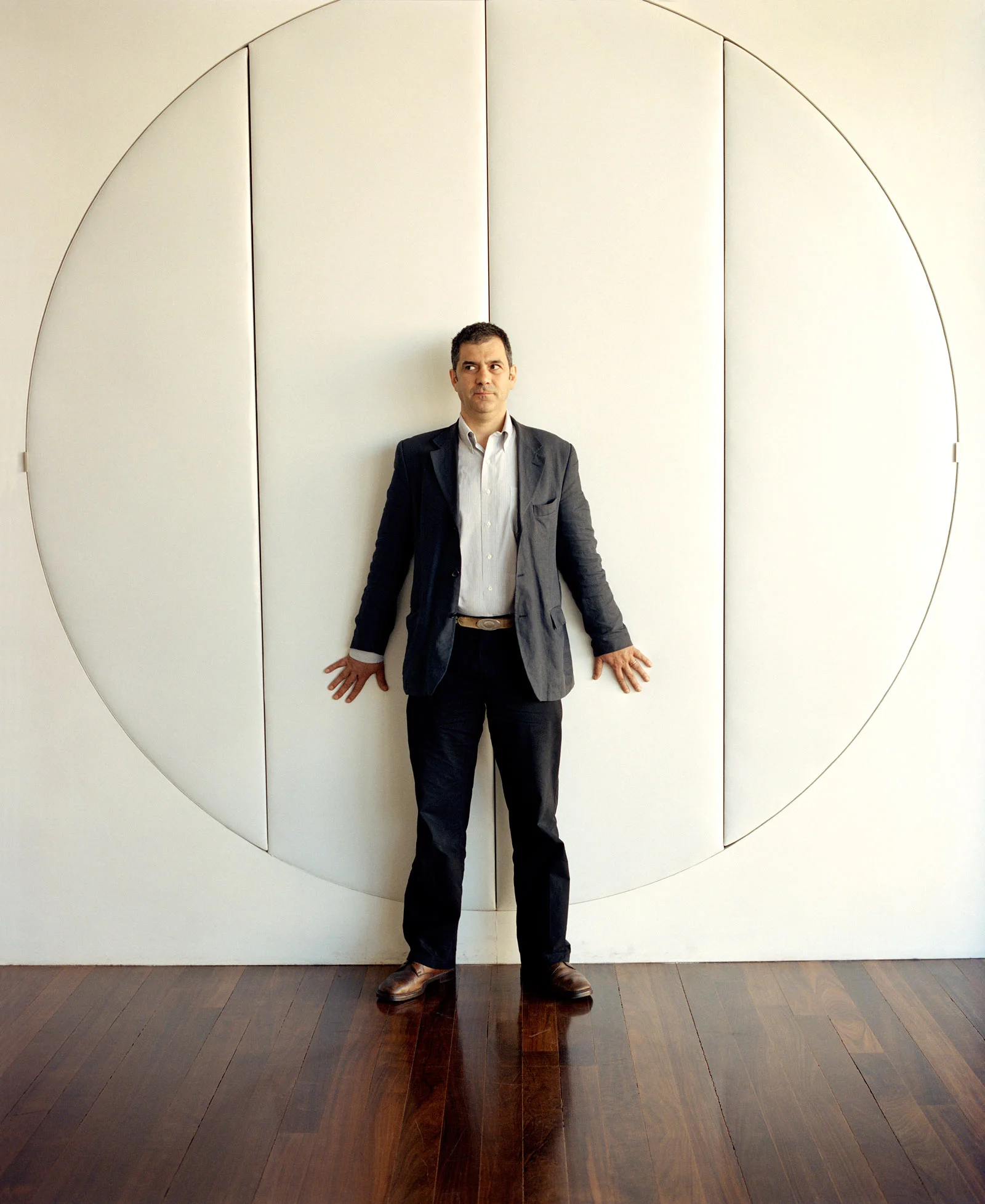 jeremy king architect standing worried in a white room rome