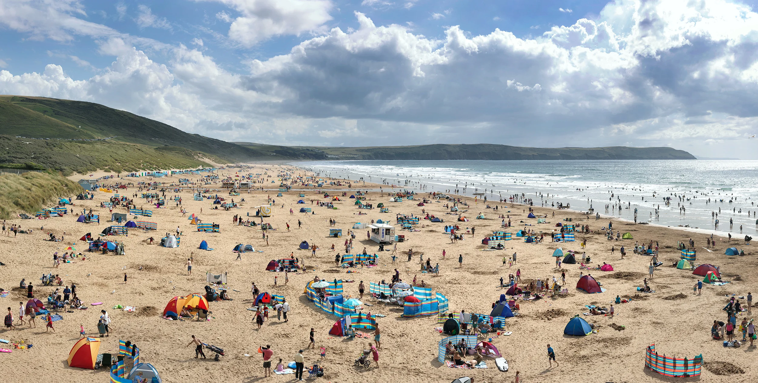 long crowded beach in summer Woolacombe beach