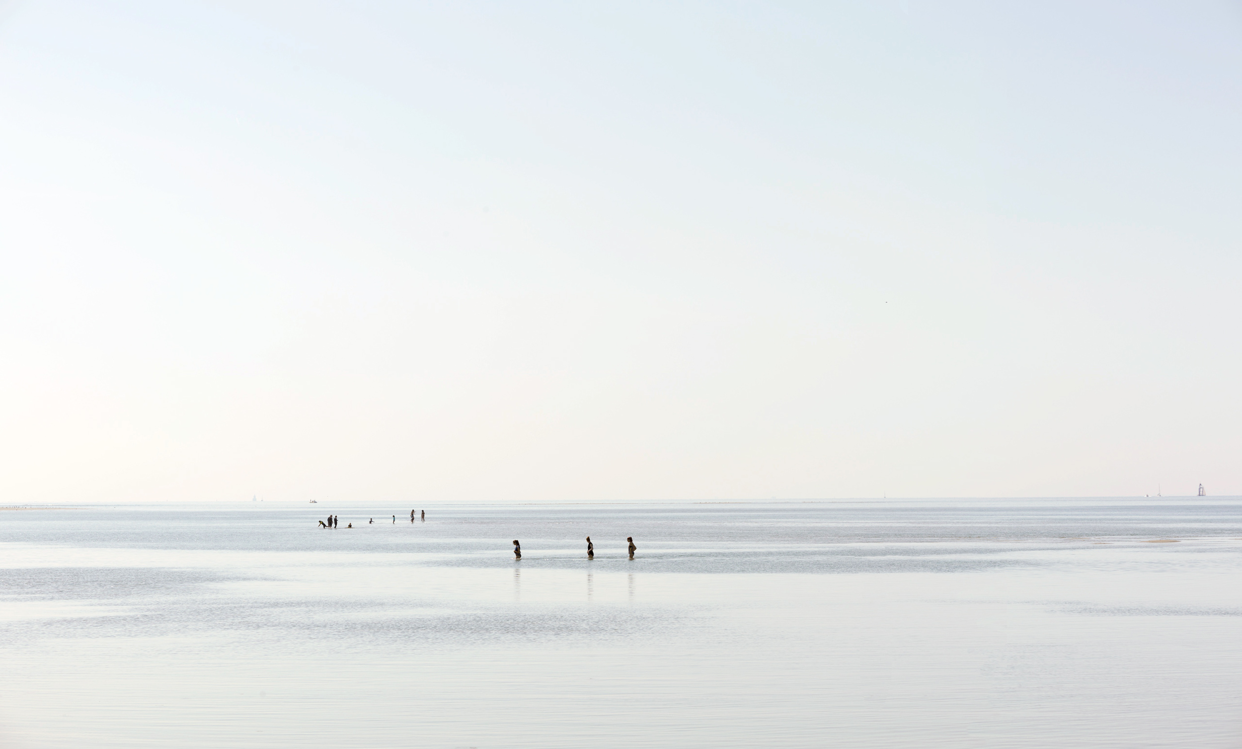 girls crossing tidal lagoon east head west wittering uk