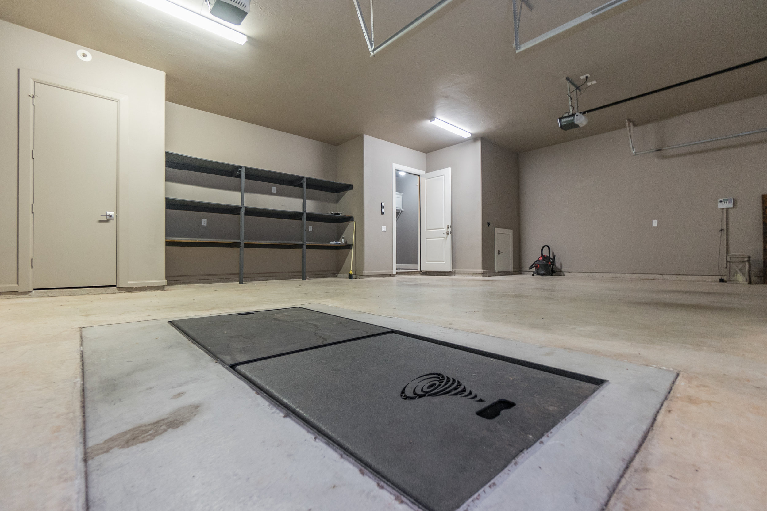 oversized 3-car garage with access to storm shelter