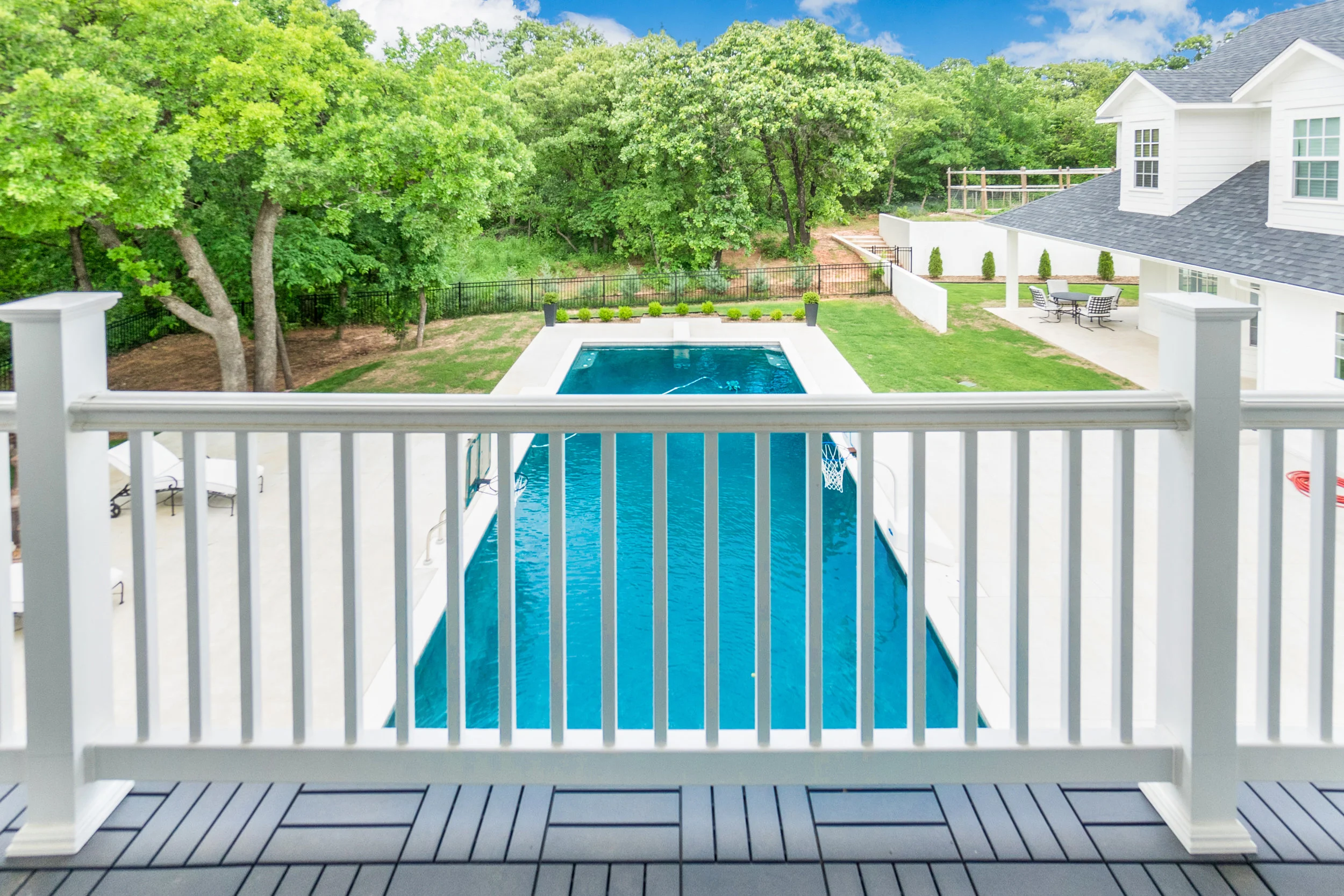 Treks decking on the covered veranda off the master. Enjoy a cool evening overlooking the pool.