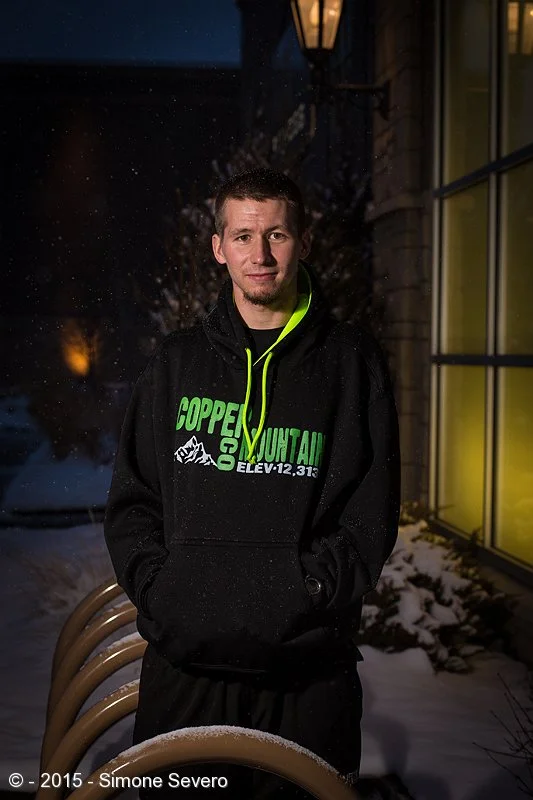 It was almost the end of the day and I had not found a subject yet. I asked Jayce if he would be my portrait of the day and he agreed in going outside. It was snowing, my lucky day. I only had a fixed lens, 85mm, and only one flash with a small umbr…