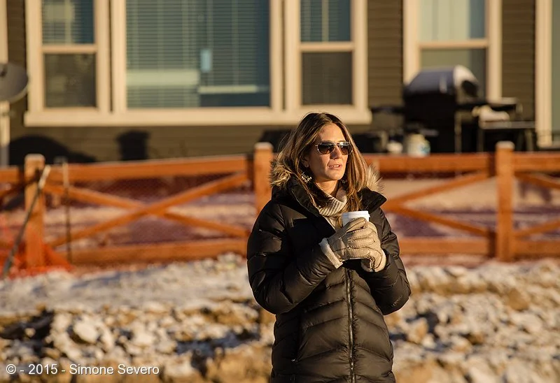 Anna is in a very special moment of her life: she is building her first own&nbsp;house. We wanted to take a portrait that marked this moment in her life, so we headed to the construction site where the big hole is being digged for the foundation of …