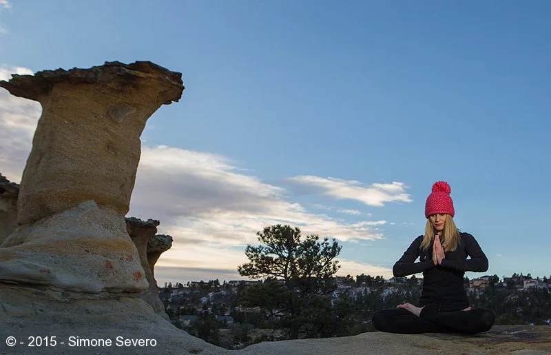 She is a morning person. She wakes up really early and walks the dog with &nbsp;her teenage children. She teaches yoga and can make poses with her body that hurt just to look at. We met before sunrise to take this picture. She was cold but we came u…