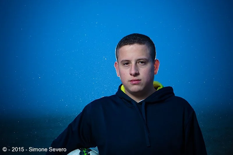 Victor is the son of my friend Maria. In the beginning, when we talked about doing his portrait, I thought of doing it on a soccer field, but the weather changed my plans for the better. Snow and fog showed up. My friend almost canceled and I begged…