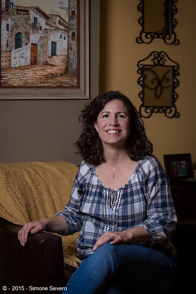 Within two hours of meeting Patty I was in her home photographing her. I love when I have the chance to meet people who are open to life and smile at things that are thrown into them. When I saw this chair with the yellow throw I knew that was were …