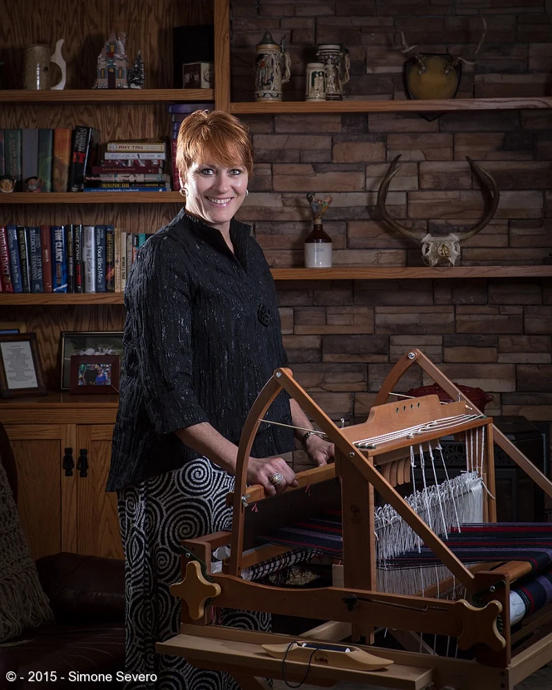 Heather is a very active person. We talked about taking pictures while she is biking - she loves long bike rides - but she decided she wanted a portrait with her creative outlet of weaving.&nbsp;She had just been in a craft show for 2 days with some…