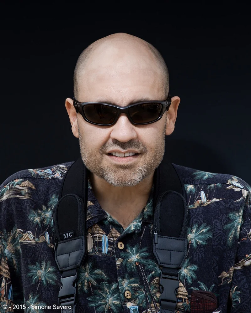 I met Ross in a workshop I was teaching . He was one of my students. He was asking questions about what to do with bald heads when using flash, so I had to demonstrate. I took 3 different pictures of him and showed him the difference the angle of th…