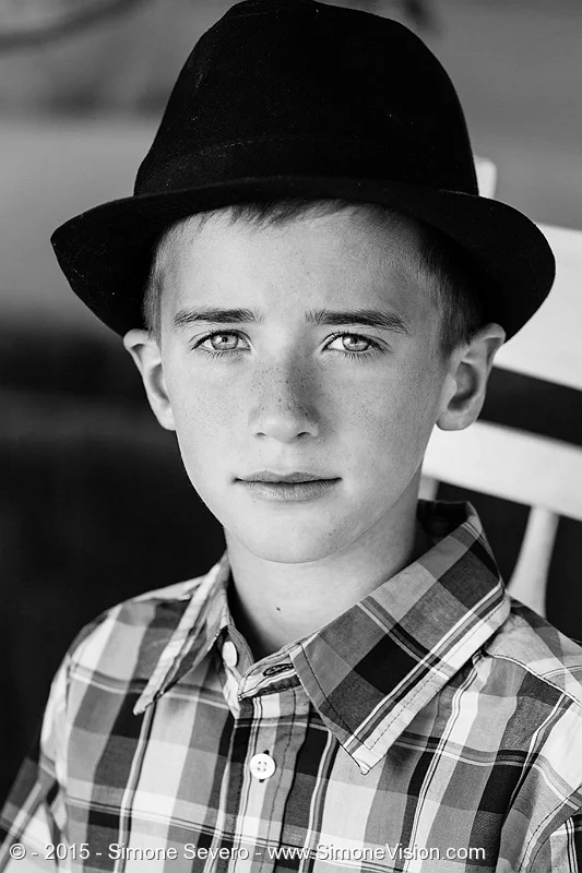 My friend Mary brought Noah for his portrait of the day. Noah has a beautiful serious look that makes him look older than he is. Beautiful. Mary was holding an octabox for speed light, the Yongnuo 568 ex ii with zoom head set to 50mm. I set the powe…