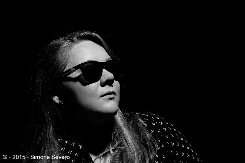 Emily is my friend's daughter. I photographed Mary yesterday and today Emily came to the studio for her portrait. It was after 8 at night.We first started making light colorful. I set up a purple gel in an Alienbee&nbsp;400 behind her to illuminate …