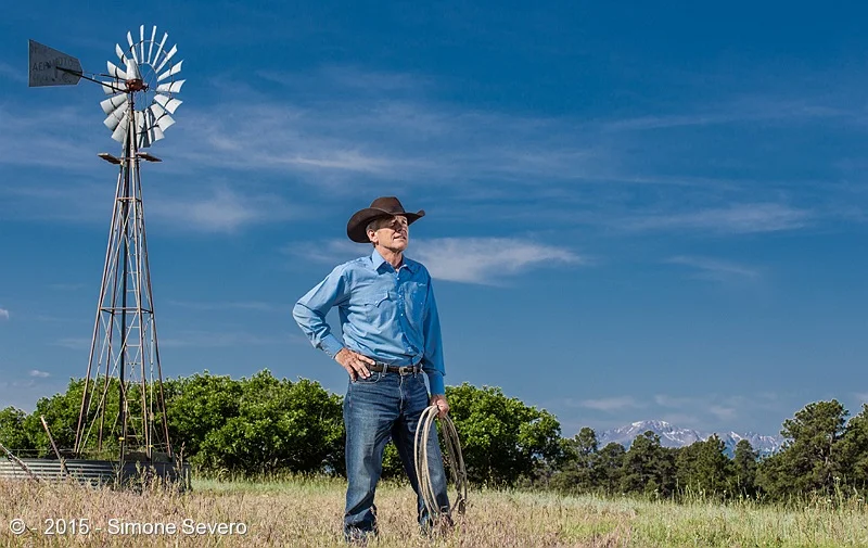 One of the first times I met John I remember him saying that his father was a barber and John was a cowboy most of his life. The cowboy hat was proof.I invited him for A Portrait a Day and we scheduled a date. We needed to re-scheduled a couple of t…