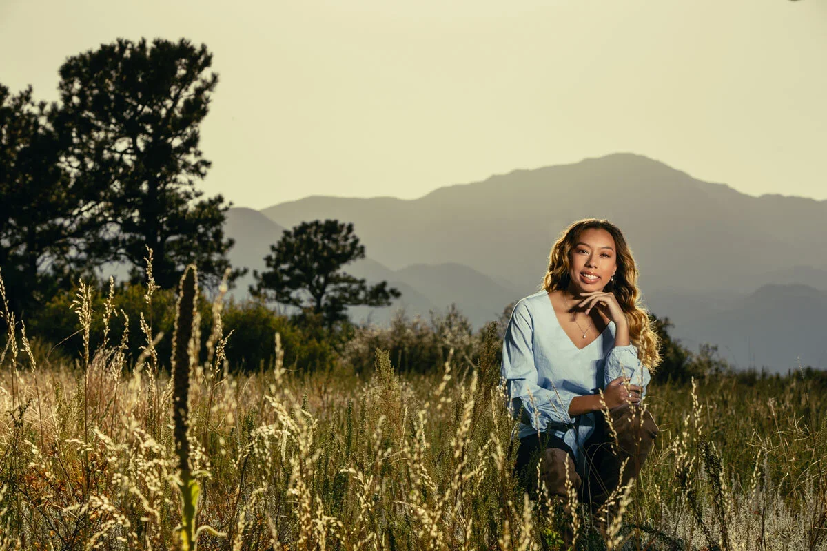 senior-picture-of-young-girl-outdoors-in-the-park-in-fall-in-colorado-springs.webp