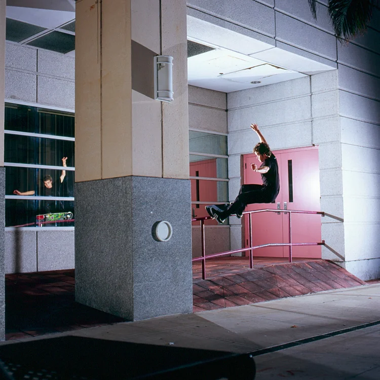 Brad Cromer frontside 50's a bank to bar in Miami circa 2008. Photo by Allen Ying