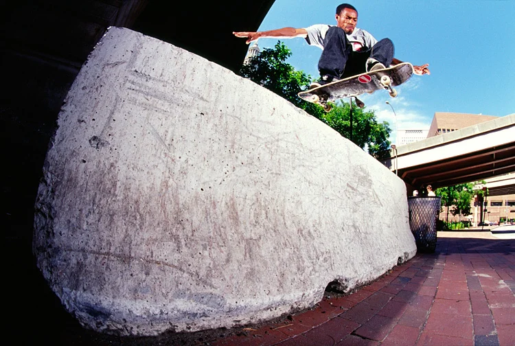 Jahmal Williams wallies the shit out of this massive police barrier under the Brooklyn Bridge in Manhattan, circa July 2007. Photo by Allen Ying