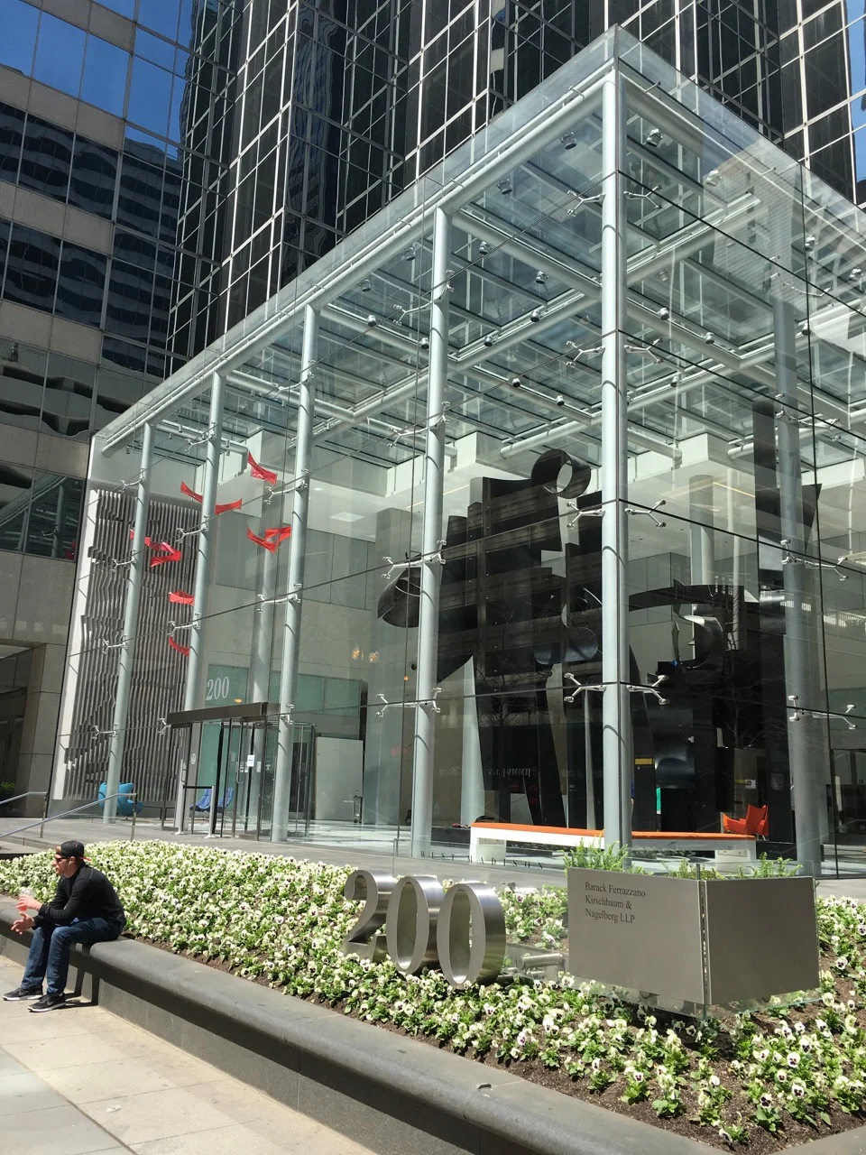 Along with a fine Louise Nevelson sculpture, the wall installation is visible to pedestrians walking to a nearby "L" station.