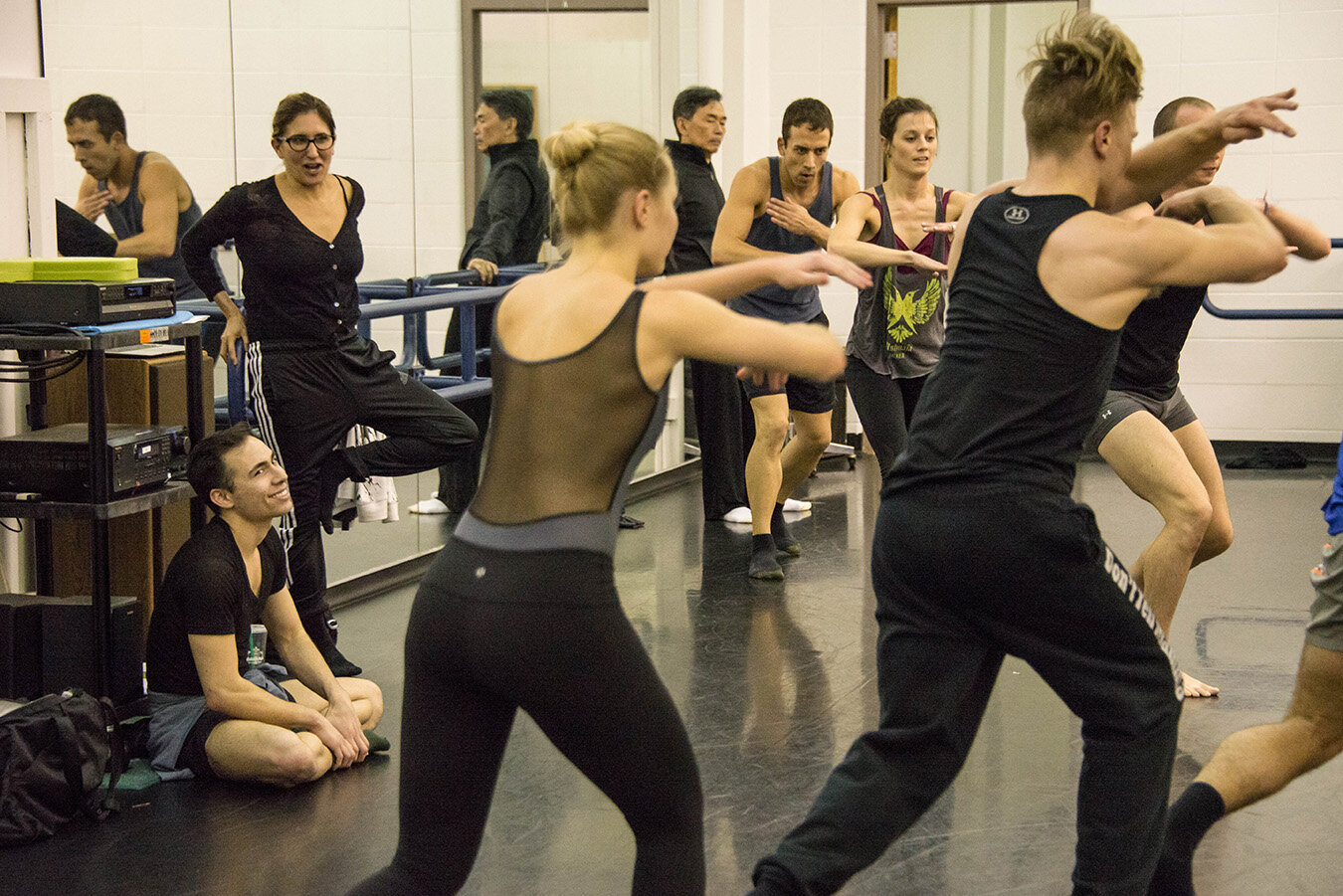 Choreographer Stephanie Martinez works in rehearsal with artists of Dance Kaleidoscope. Photo by Crowe's Eye Photography