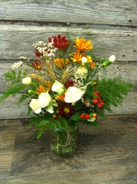 Beautifulfall arrangement in a mason jar 