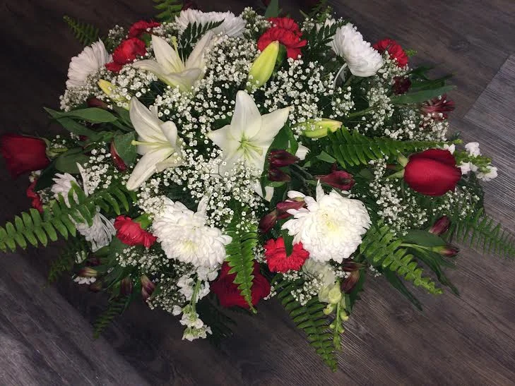 Red and white casket spray