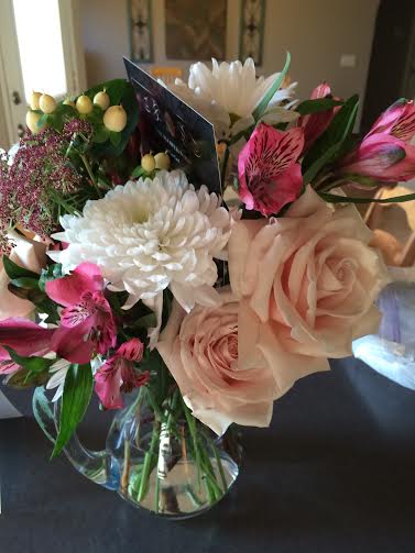 Blush roses in a pitcher 