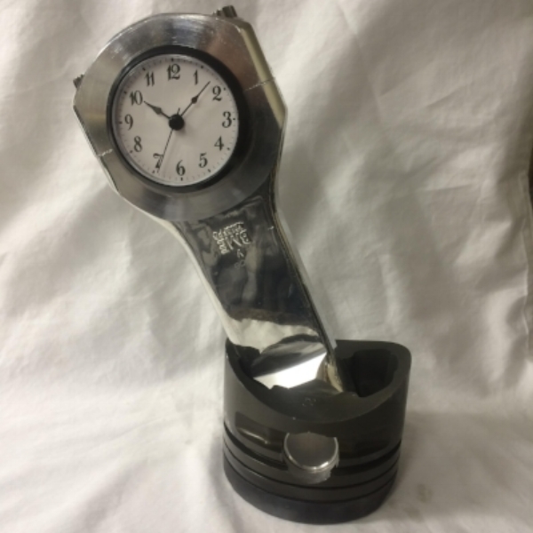 Piston rod clock 